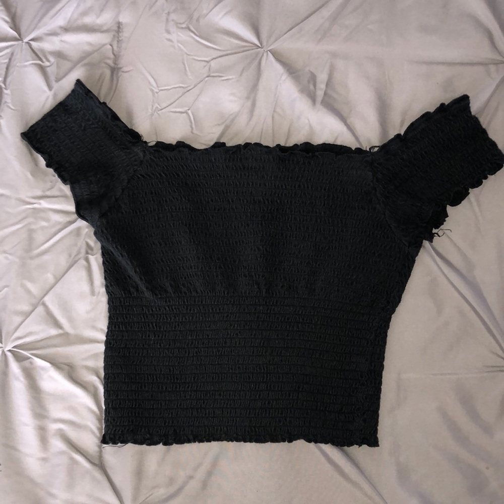 Black off-the-shoulder shirt